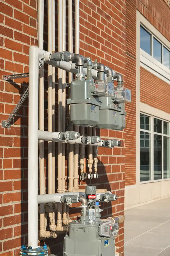 Custom fabricated gas manifold installed on a commercial building