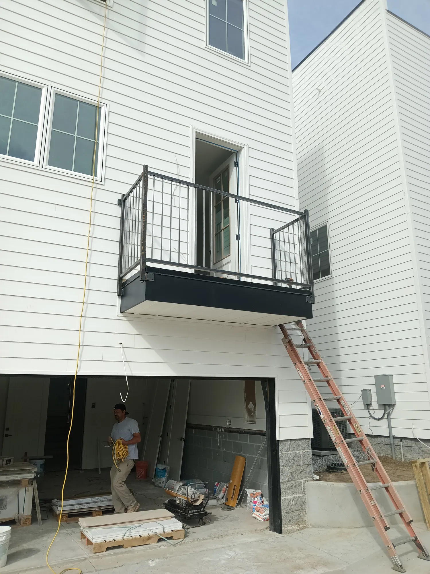 Installed steel balcony railing completed on-site by Music City Specialty Welding