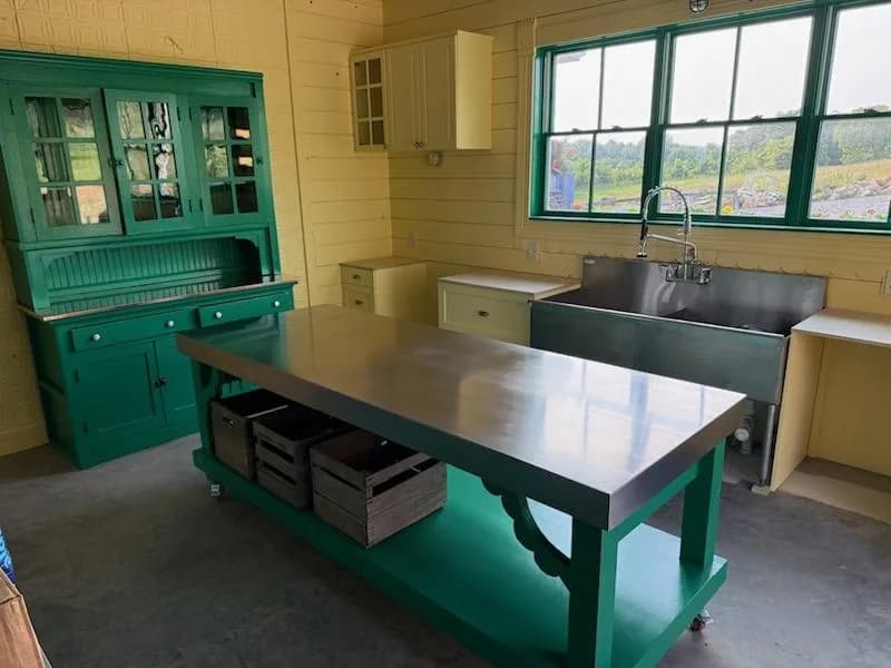 Finished custom stainless steel worktable and sink installed in a Middle Tennessee workspace