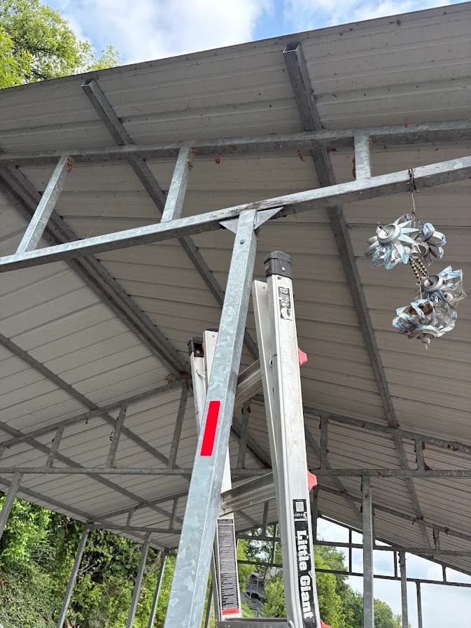 Steel canopy frame being fitted and welded on-site